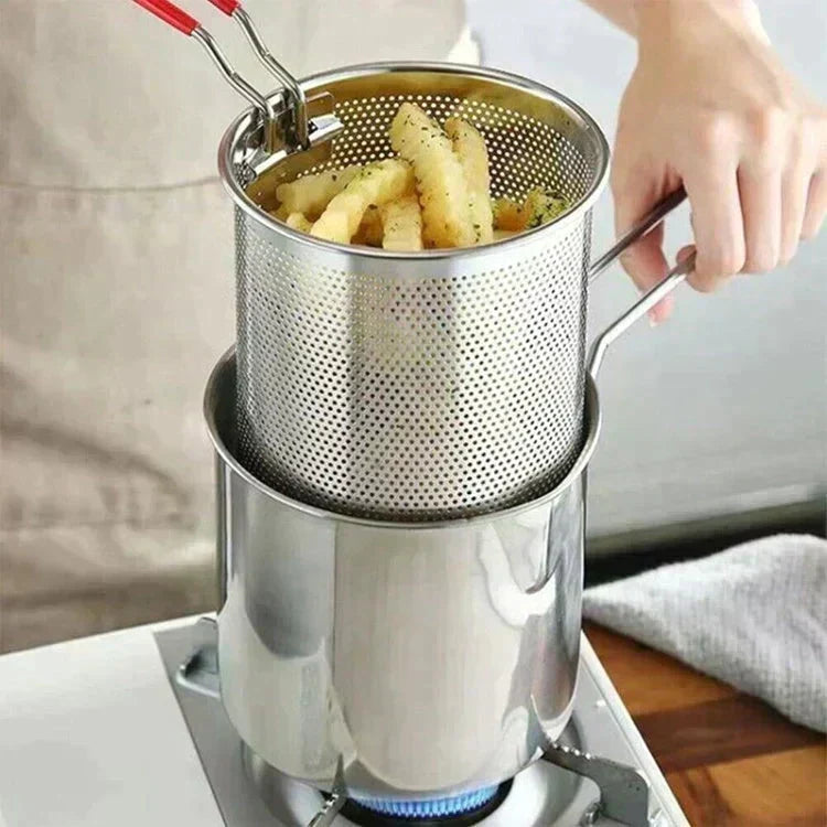 Compact stainless steel fryer basket being lifted after frying